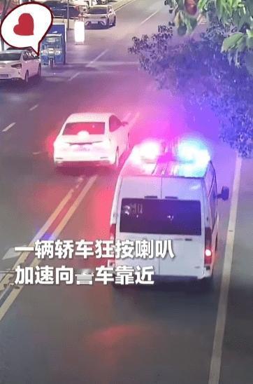 浙江一警车正在巡逻，突然一轿车加速靠近，狂按喇叭将警车截停！民警打开窗户，就听到