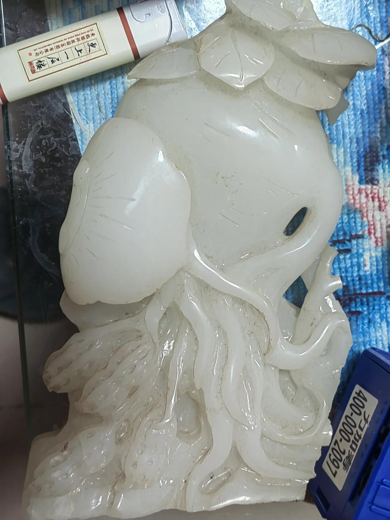 十块钱买的残玉，高二十公分，宽十三四公分，重二三斤！
主要是值得吗？？？