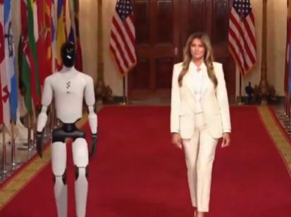 【梅拉尼娅·特朗普在“共同培育未来”峰会的第二天以引人注目的方式亮相，她身边伴随