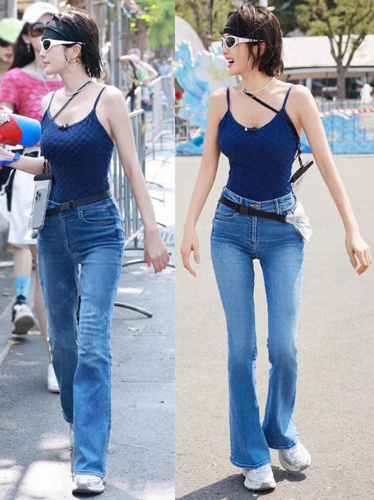 秦岚穿着藏蓝色细肩带吊带，低调沉稳的色调衬得肤色更透亮，带点肌理感的面料贴合身形