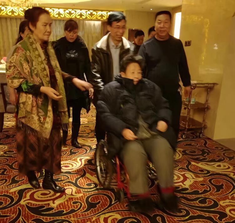 李讷出席活动时的一幕
