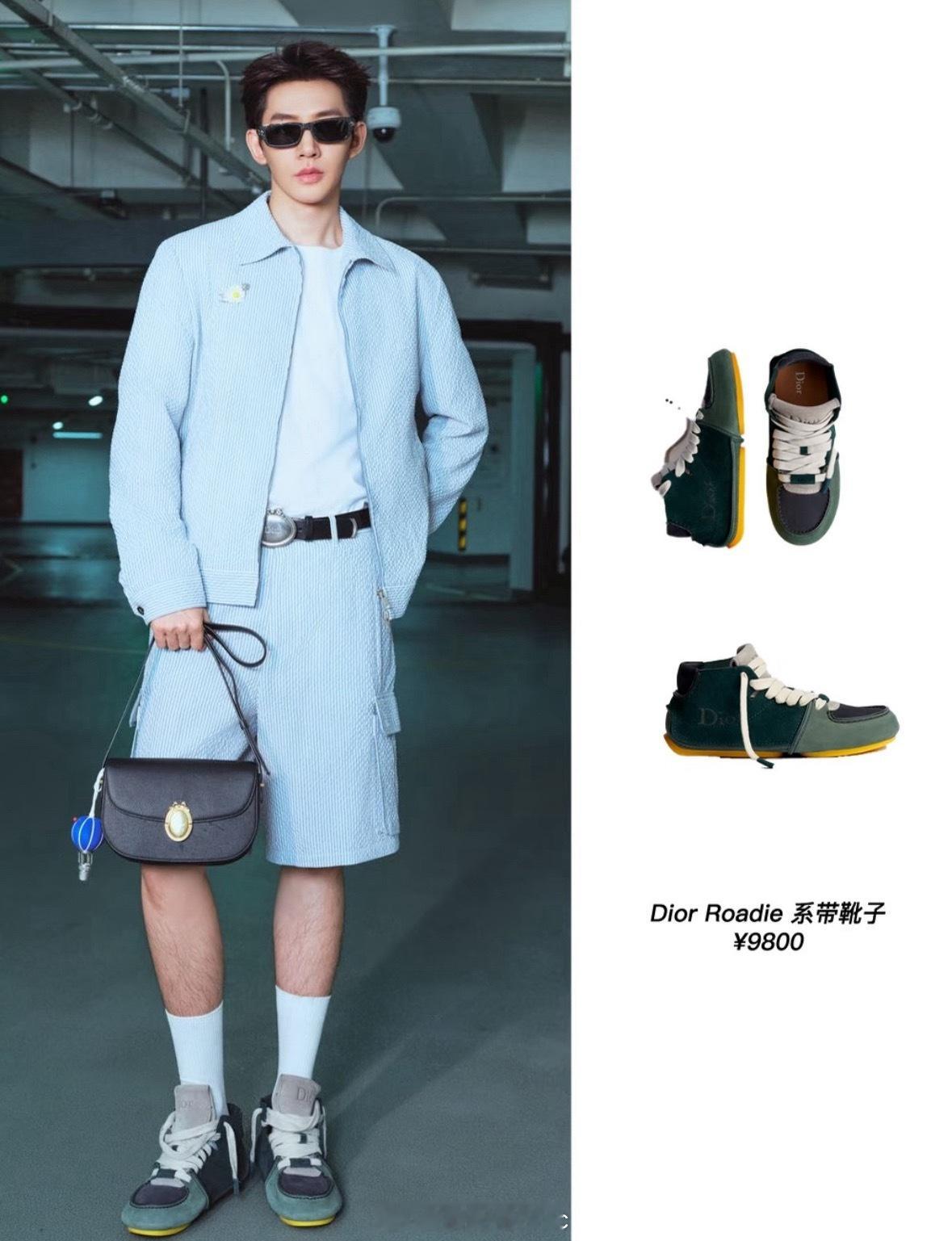 邓为淡蓝色条纹夹克+工装短裤，很好的诠释矜贵Dior Man，胸前点缀雏菊胸针，