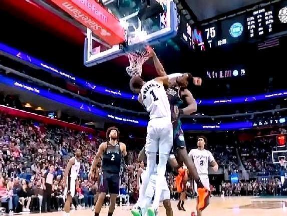 文班亚马被活塞中锋骑在脖子上砸了个2+1，全场都炸了。你以为他被打懵了？恰恰相反