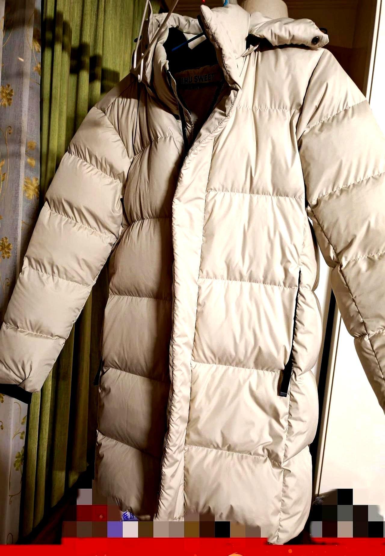 波司登那件淡蓝轻薄款，86g绒，我上身十分钟就冻出鼻涕，风直接穿透布料，像穿件塑