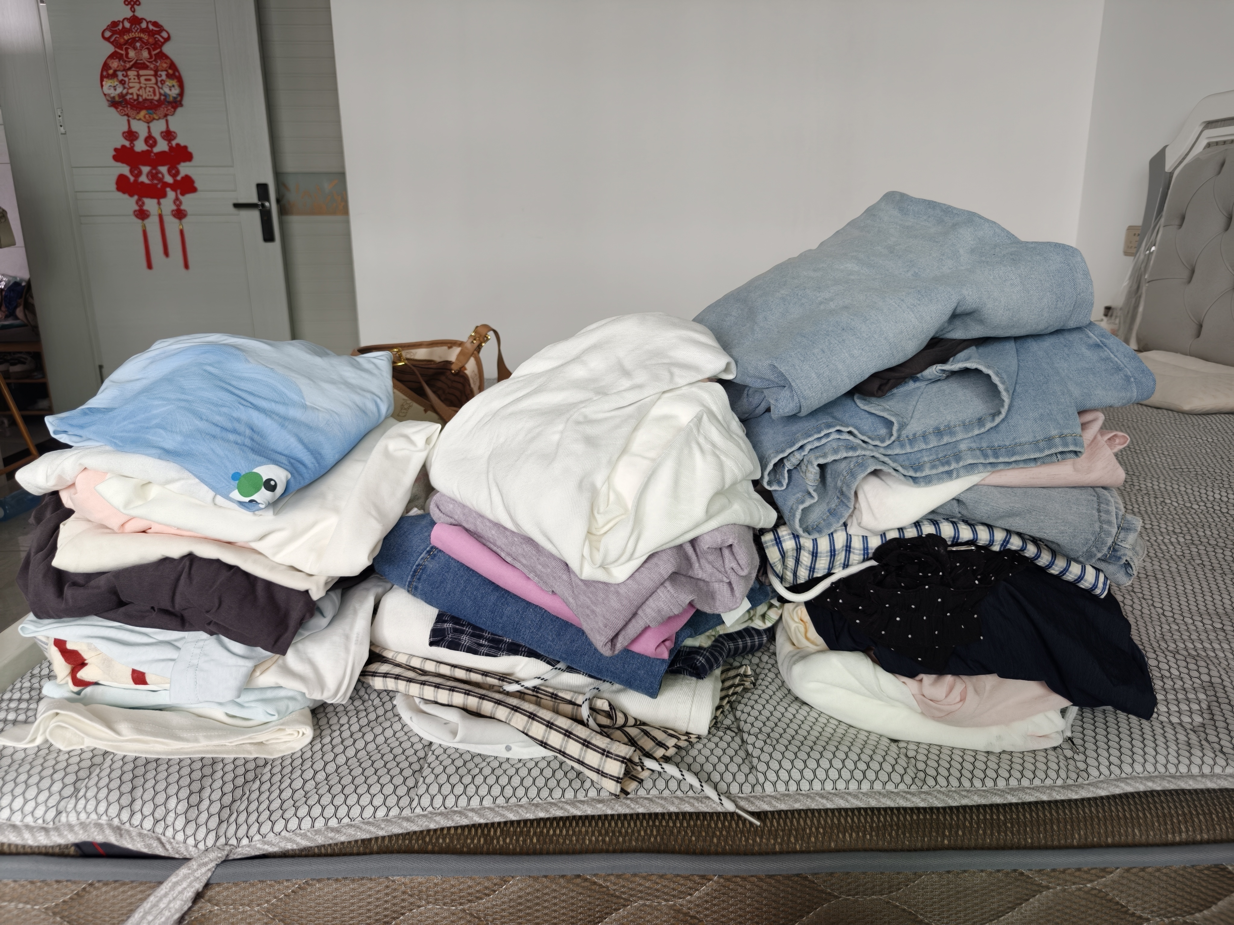 今年买的所有衣服，开始疯狂收拾
