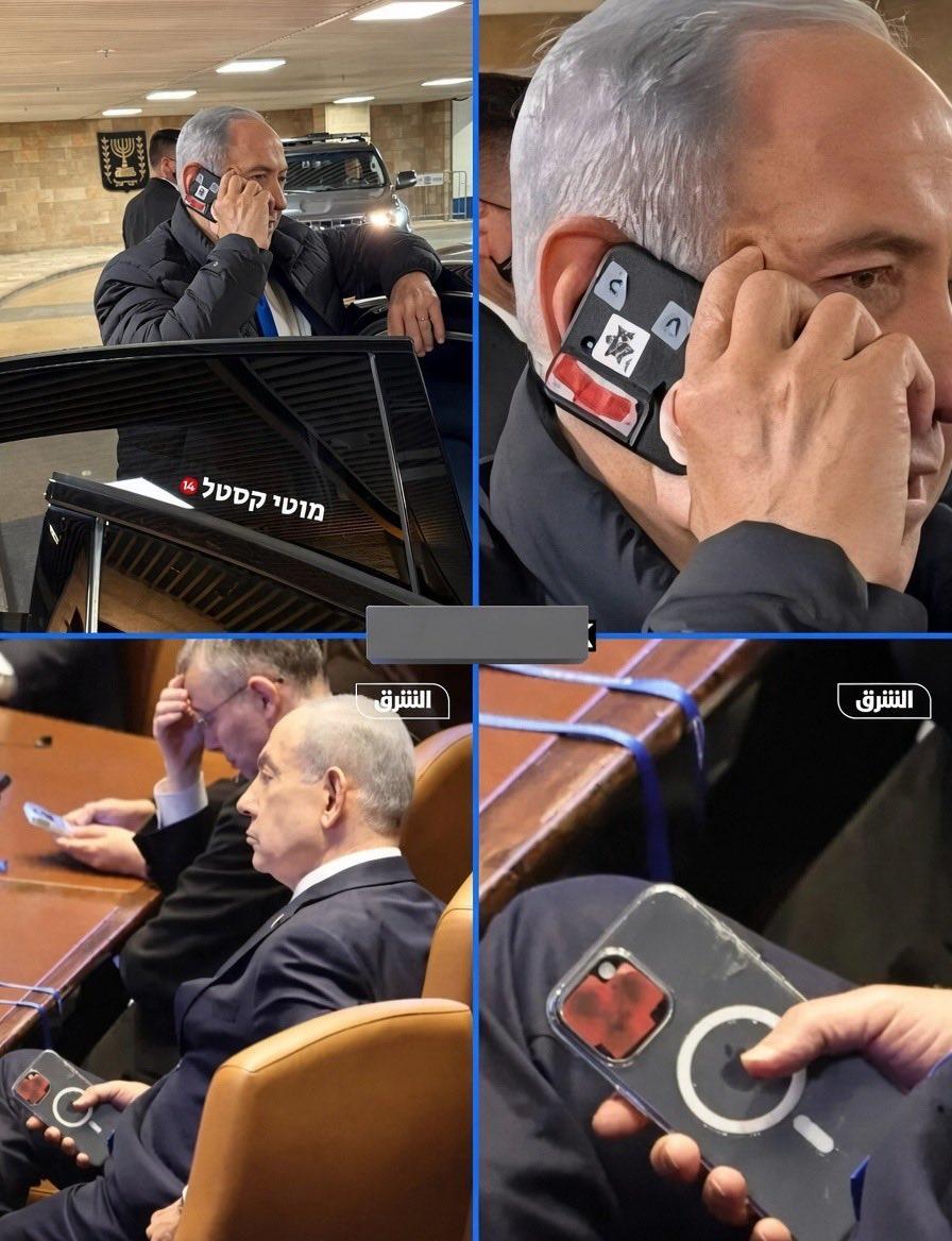内塔尼亚胡的手机已经很旧了，但他在手机上贴了胶带。 普通人通常不会在手机摄像头上