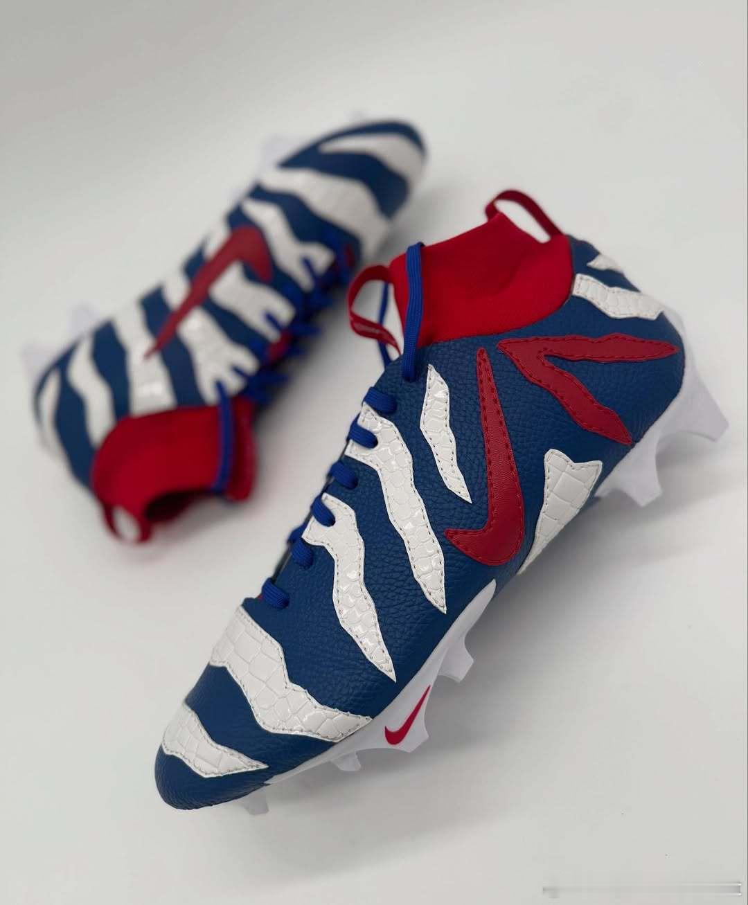 纽约巨人外接手万代尔罗宾逊上脚Ja 3橄榄球鞋。