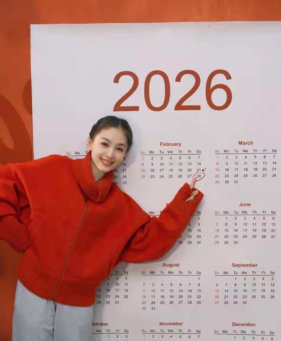 王子文昨天发的生日照 ,39岁的人看起来跟19岁一样！ 一袭亮红色外套，捧着白色