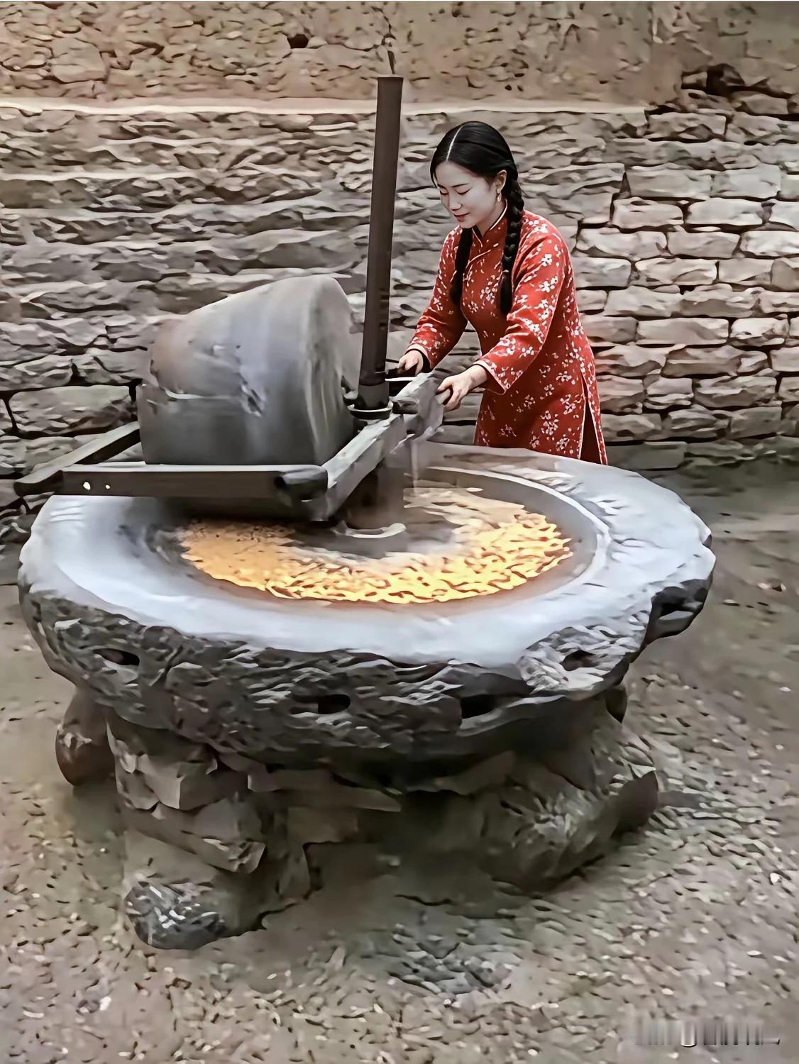 石碾轻推岁月长，
红衫素手碾金黄。
古村墙下春风软，
袅袅炊烟想家乡。