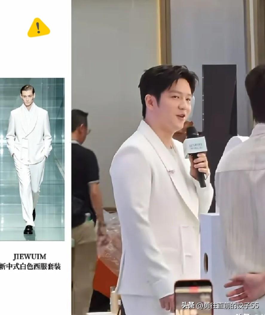 樊振东一现身就成了全场焦点，这套白色西装造型确实少见。正面看身形清挺，作为乒坛世