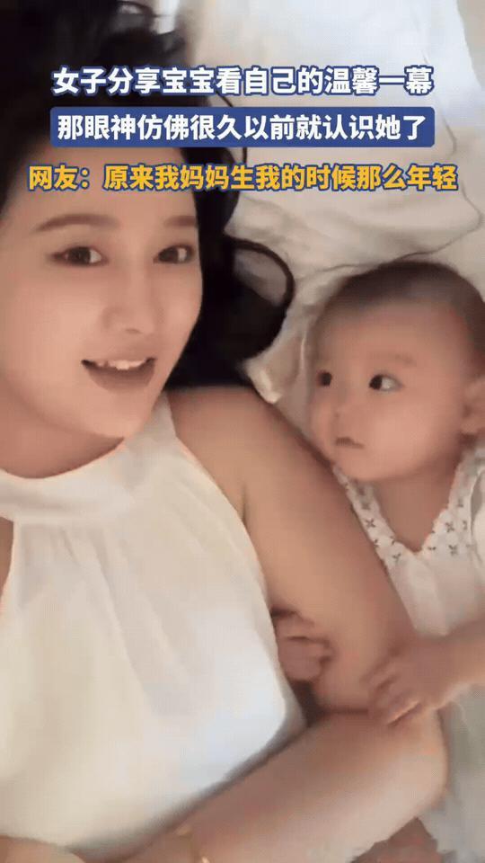 这个画面太治愈了，可惜最后被宝爸闯入镜头太煞画面了。

清晨的阳光落在床上，妈妈