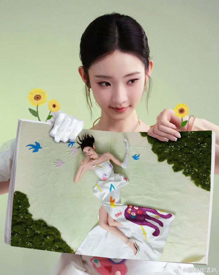 张艺凡把小朋友的画穿在了身上 张艺凡这组图，把童年和童话串在一起了。小朋友的涂鸦