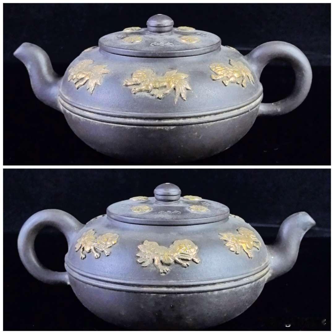 什么样的紫砂壶值得收藏?
品读黄玉麟贴金瑞狮紫砂壶，感悟紫砂大家的艺术魅力
 