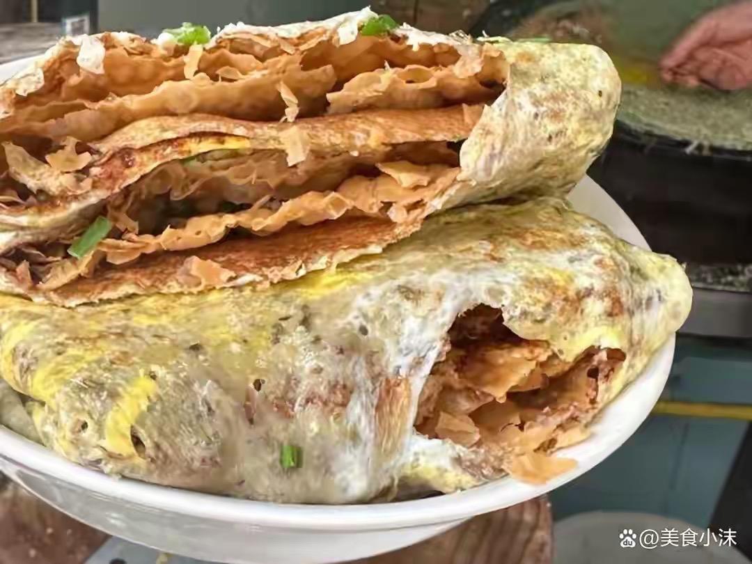 天津“10大早餐”，都是津味精华，你吃过几种

1、煎饼果子
2、锅巴菜
3、大