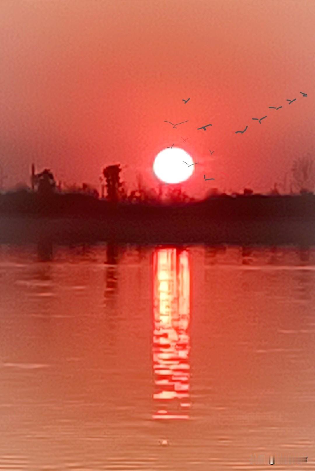 上联（对句）：半野红霞迎数雁，
下联（出句）：一湾碧水抱孤舟。