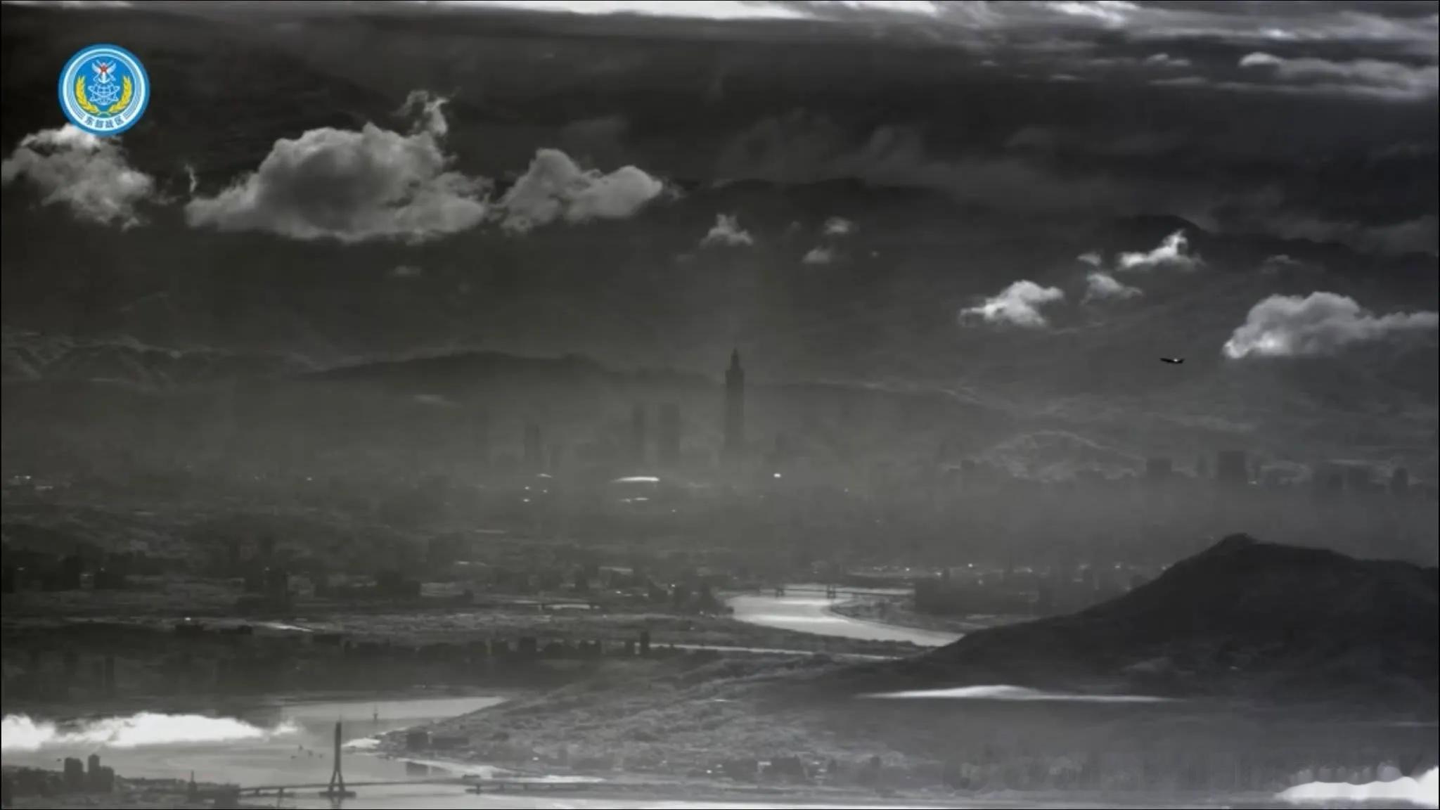 新闻联播出现台北101大楼画面官方发布的短片显示，解放军无人机在飞行过程中从高空