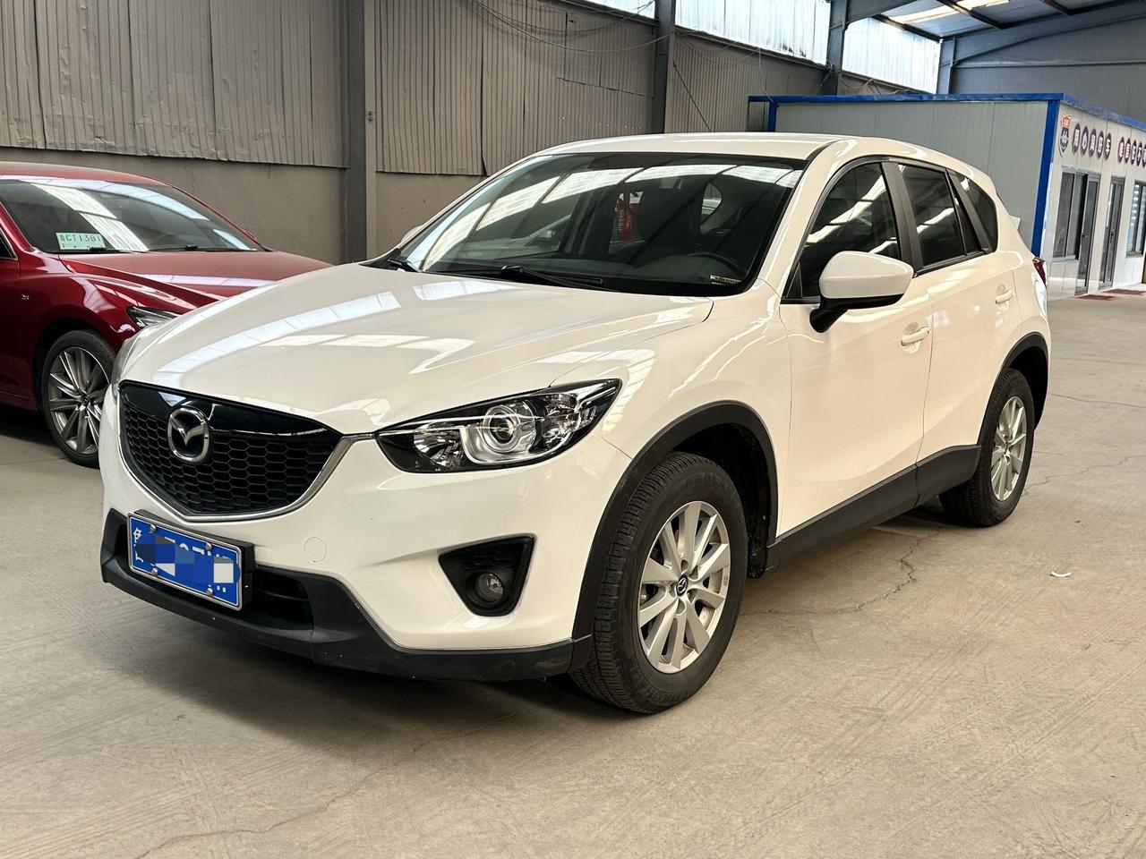 14年10月2.0马自达CX5，13万公里实表，补漆多，3万多代步车，能开的住，