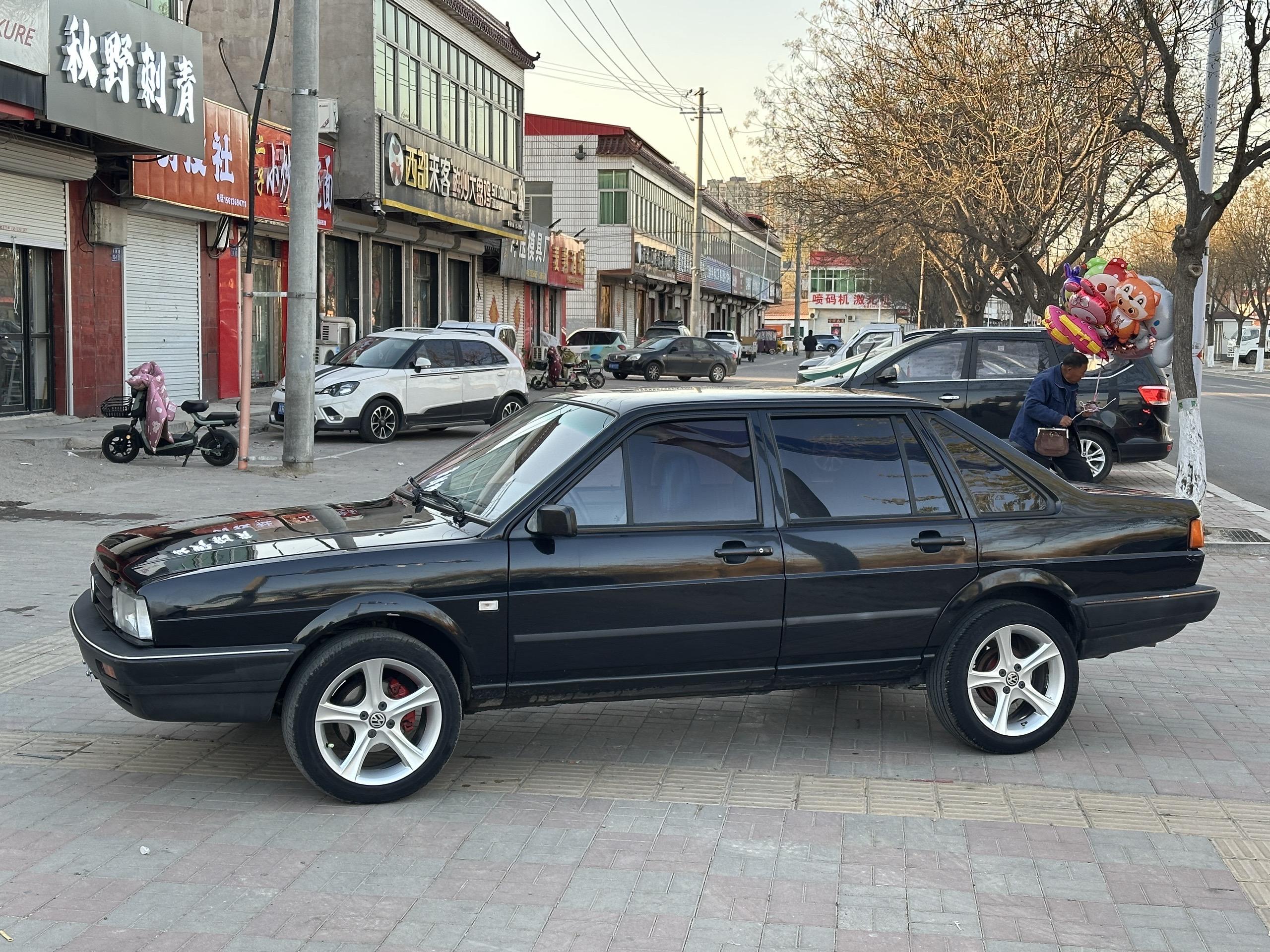 白捷达，黑普桑，后备箱里……