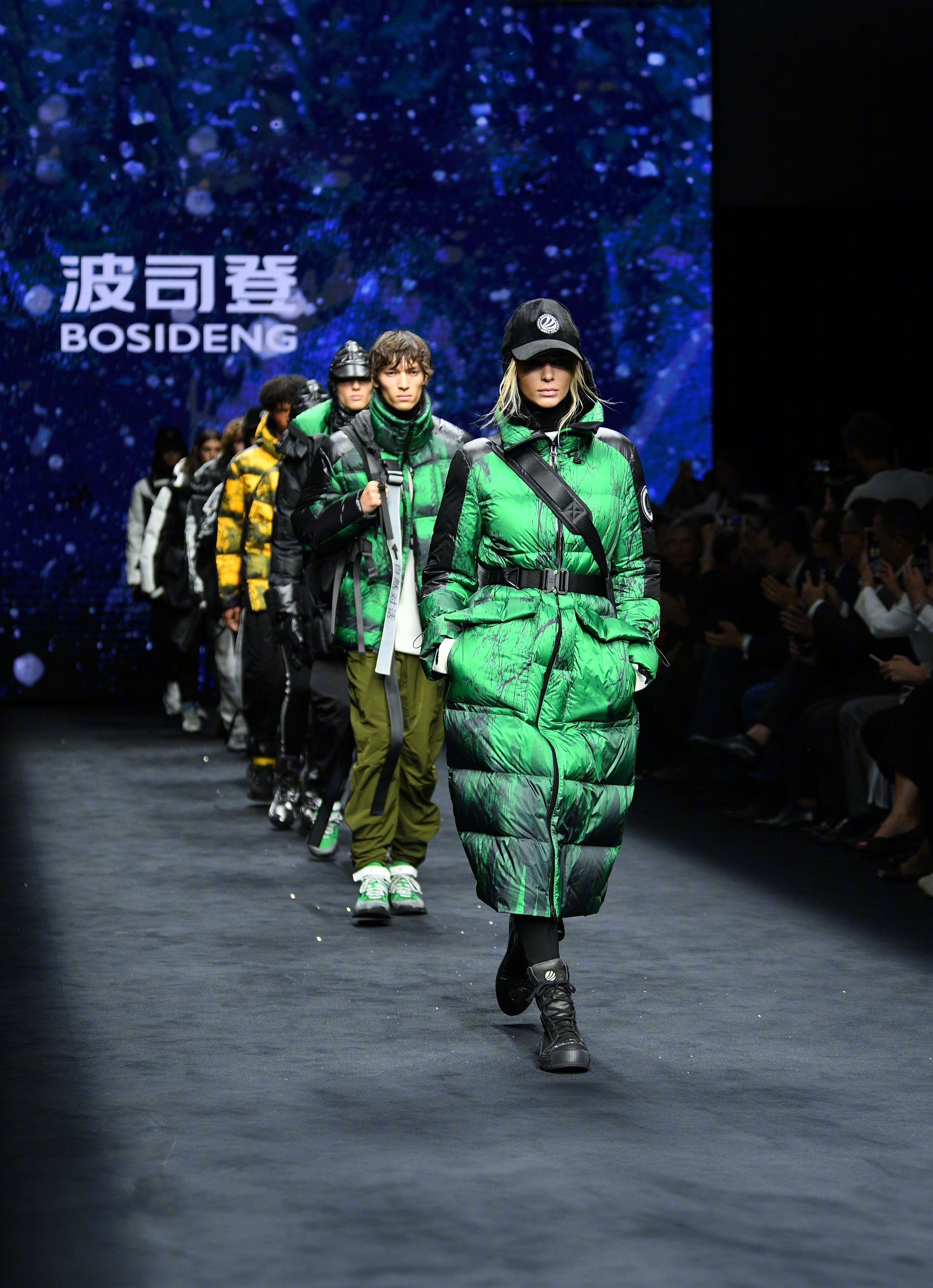 波司登集邮国际顶流设计师 为什么国际顶流设计师纷纷选择波司登？答案藏在四大时装周