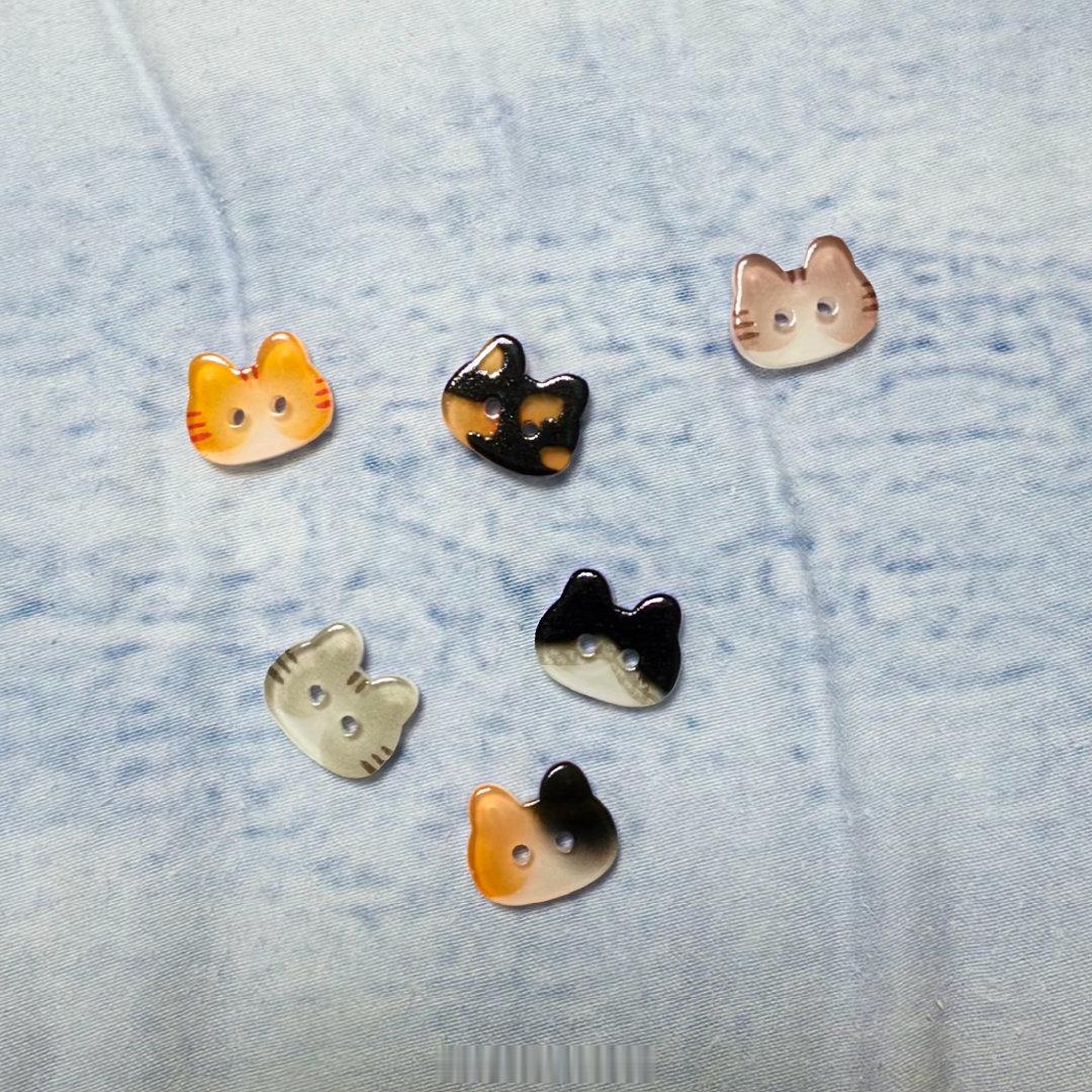 北京碎片 买的衣服纽扣我不太喜欢，搜了下tb有各种可爱的纽扣，猫起来！ 