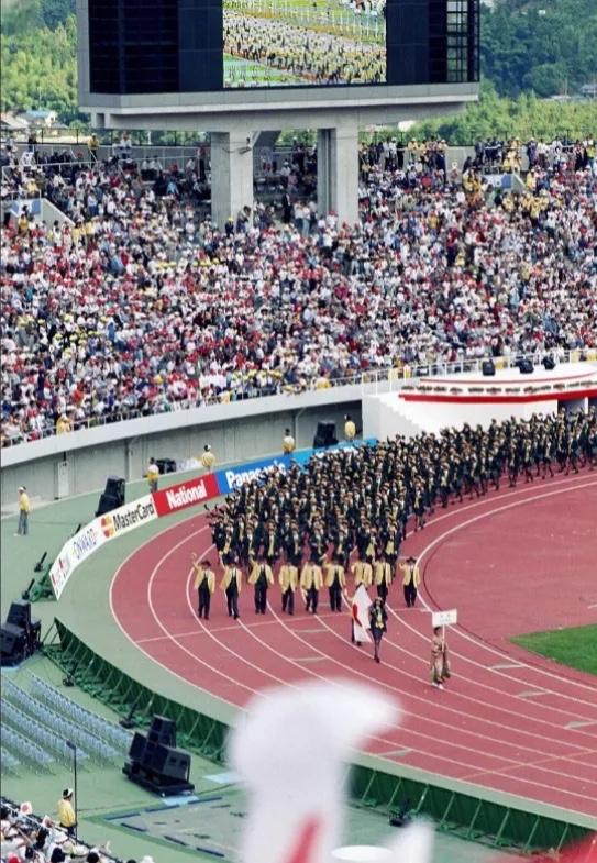 名古屋亚运会的圣火刚在爱知县点燃，1200余人的中国代表团连赛场大门都还没踏进去