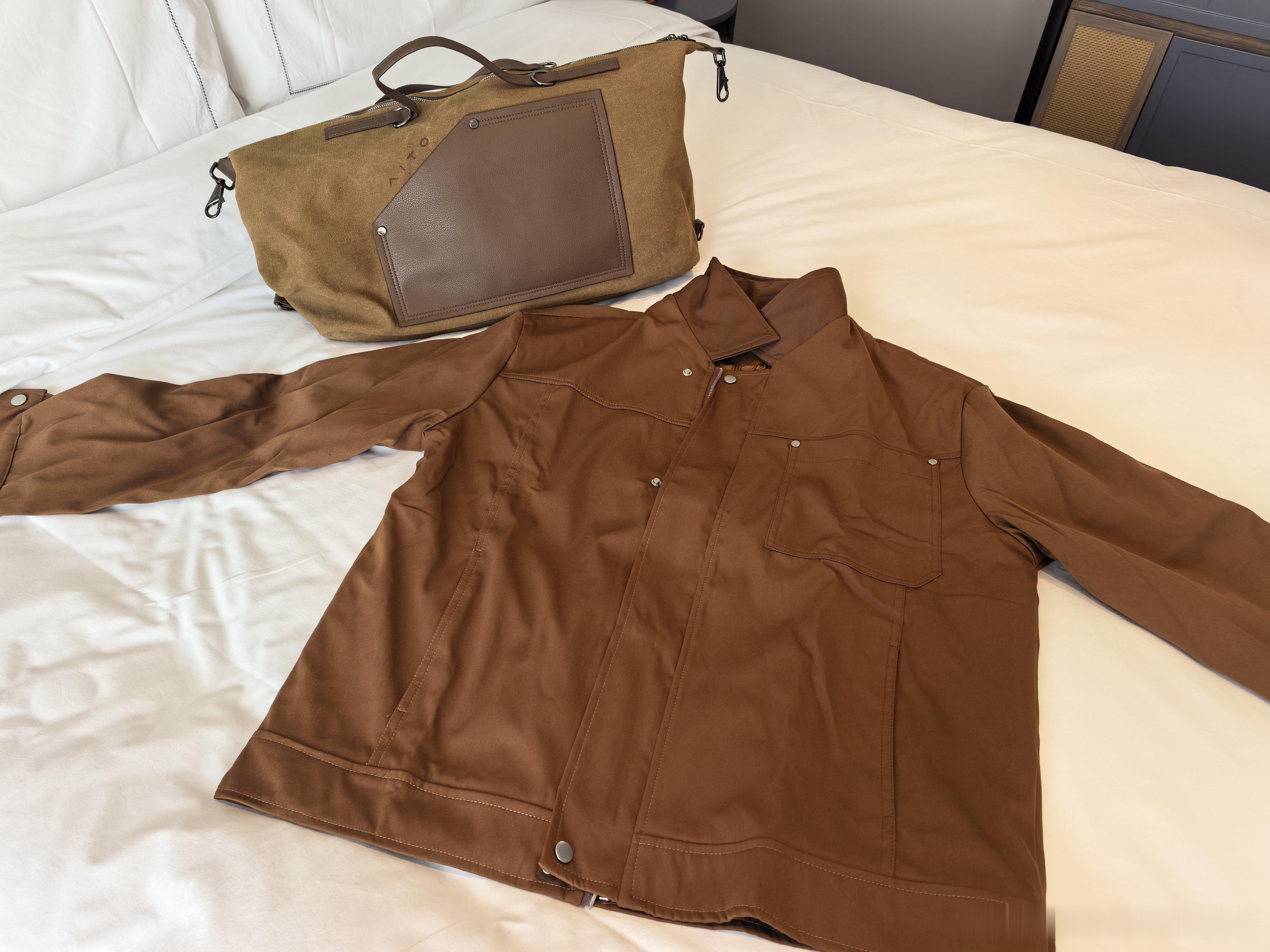 别的不说，这次给我们准备的衣服和包就很“喀什”问界m9