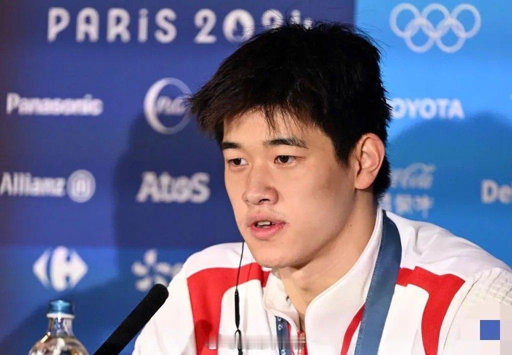 央视记者董倩在采访潘展乐时，看他情绪不高，脸上全是烦躁的神色，就直接问他：你是不