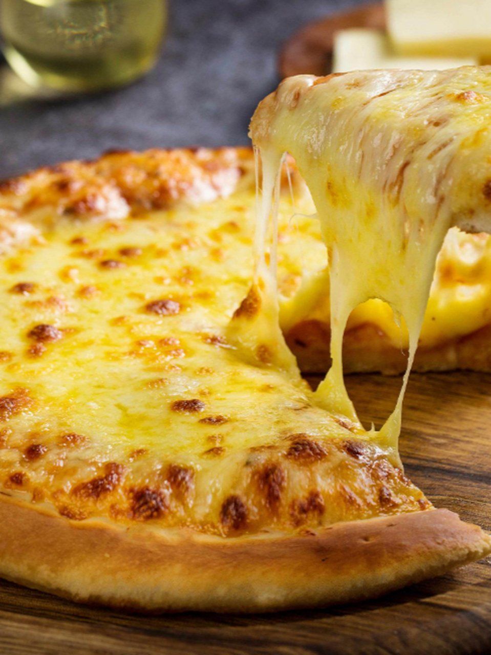 春节最怕的就是餐餐都是大鱼大肉，现在最想的就是吃点清淡的，例如披萨