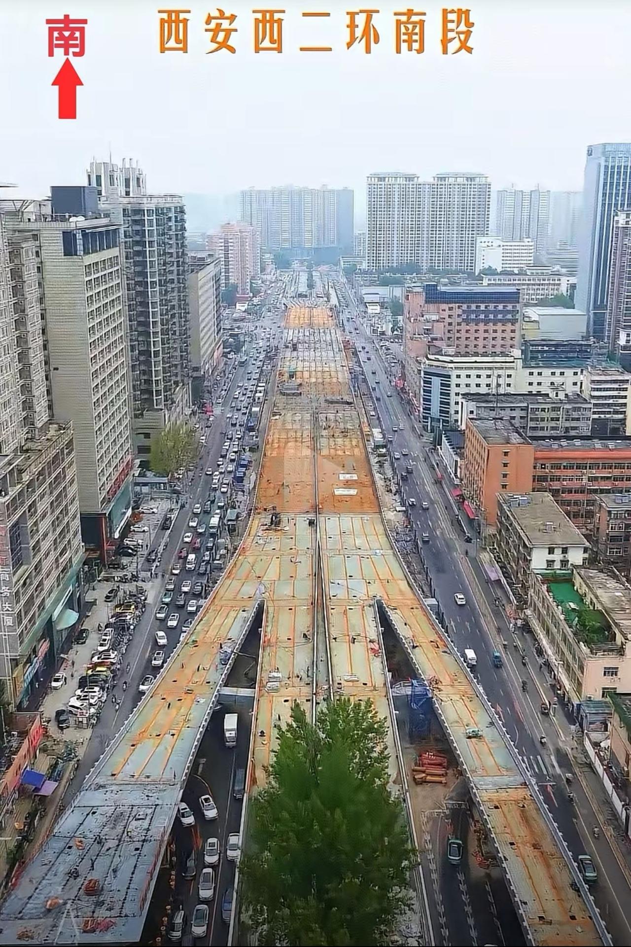 这就是大西安的西二环南段，不出意外的话，这条路一旦修通，会把车流量进一步压缩到北