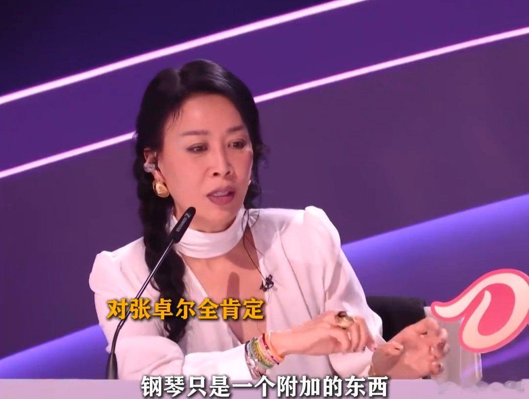 那英力挺张卓尔唱什么都是对的声鸣远扬 被那英圈粉！她力挺张卓尔的样子，暖心又霸气