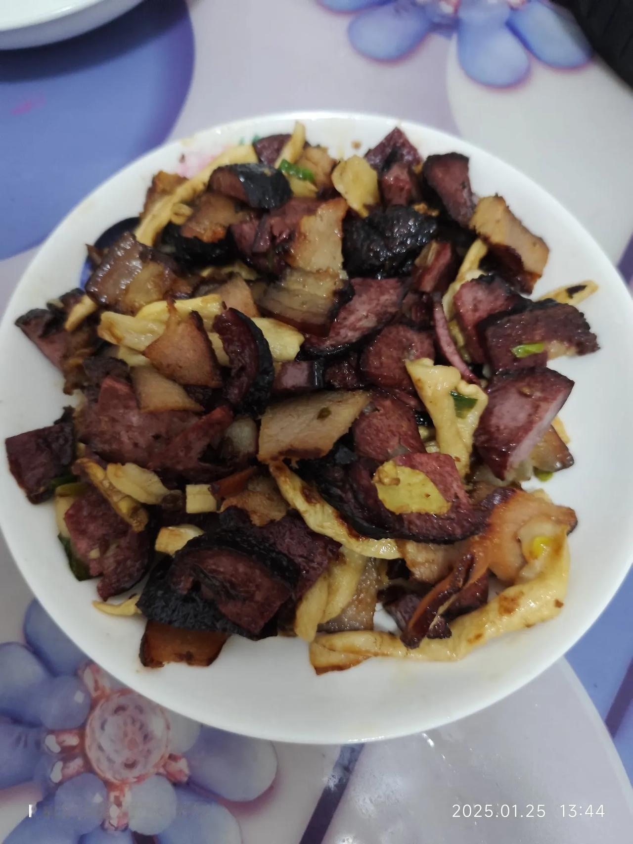 说出一个菜名证明你是哪里人猪血丸子