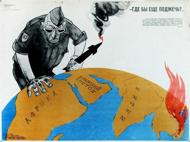 一个戴着黑眼镜的美国大兵，一手握着个点了火的导弹，一手按着地球，寻觅着下一个可能