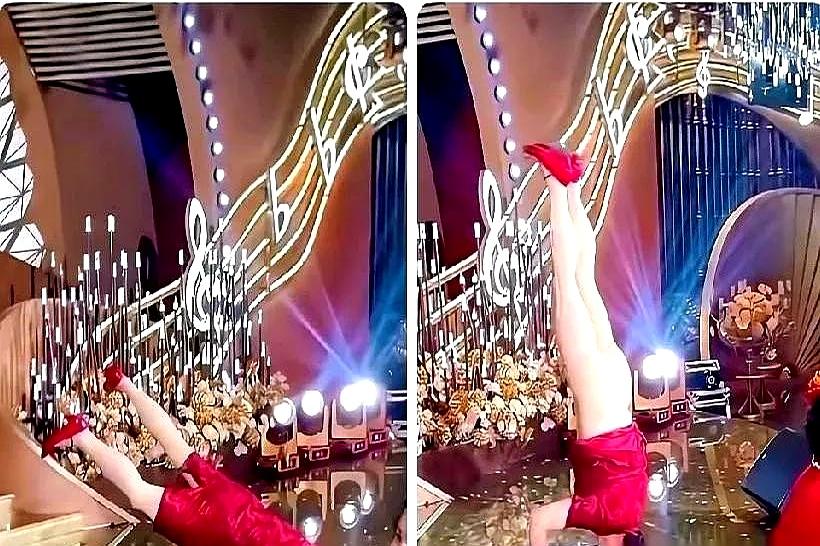 婚礼现场炸锅了！
喜婆婆穿红裙子衩开到胳肢窝，当啷一下双手撑地倒立，俩腿绷得笔