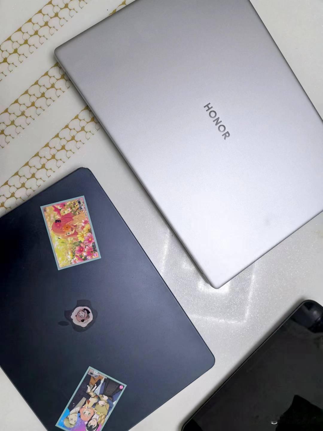 苹果MacBook Air M2版本和荣耀Magicbook X16 2023怎