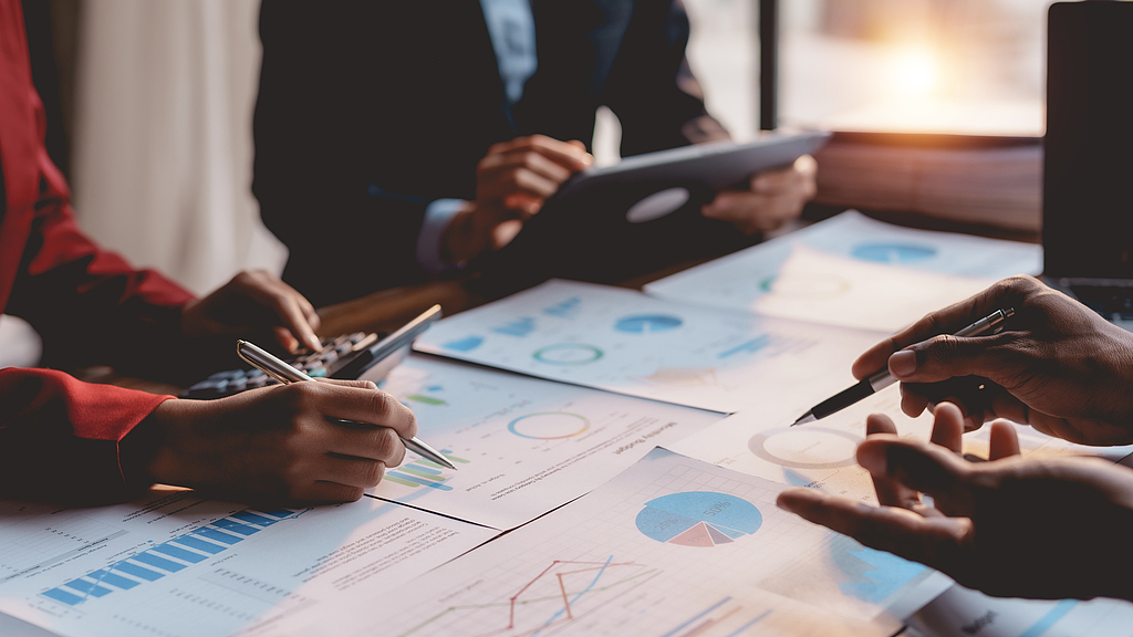 国泰海通三季报“交卷”：净赚220亿元，总资产突破2万亿，整合效能待深化