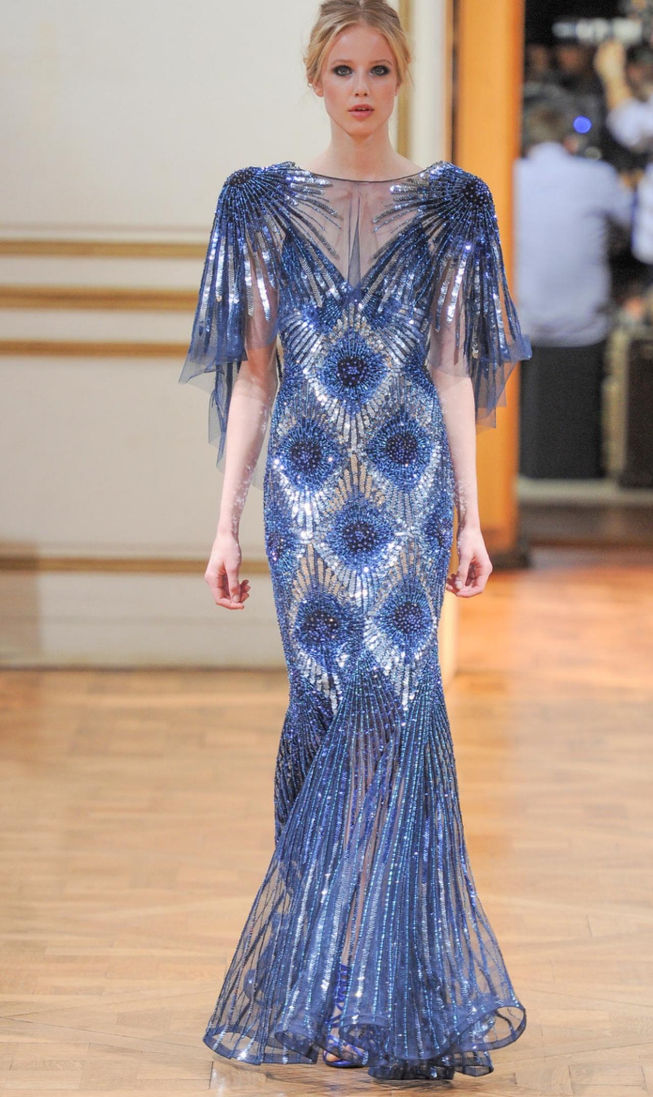 Zuhair Murad 2013秋冬高级定制的廓形以鱼尾裙为主线，将女性身体的
