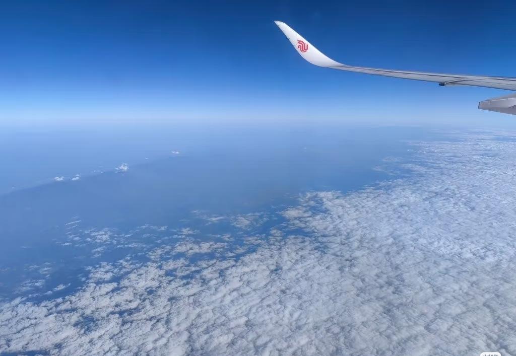 由北往南，过了秦岭就是满天云层