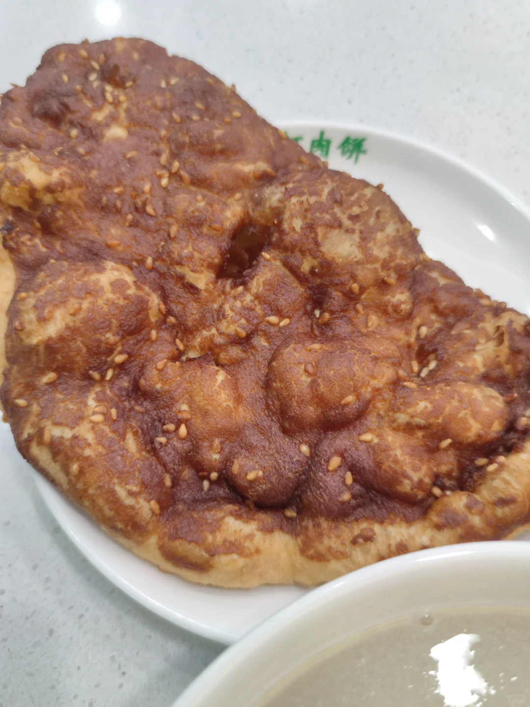 豆汁儿还是得配咸菜丝儿