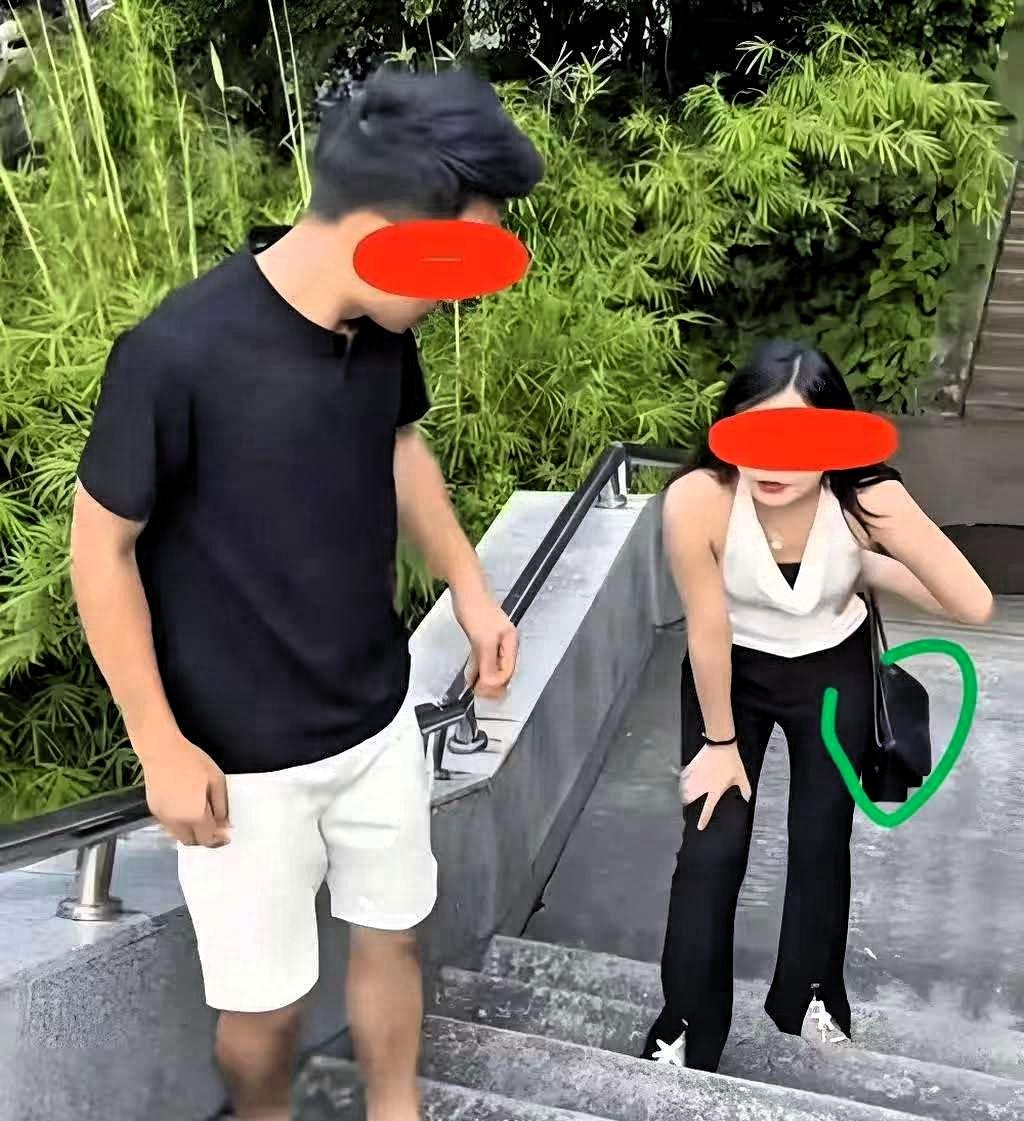 男子带着小三去爬山，途中遇到自己的老婆，当时他老婆没有揭穿男子和她自己的关系，她