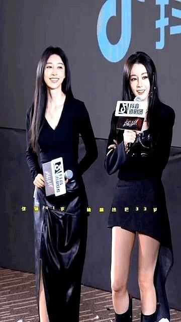 我跟你讲，什么叫“合影杀手”，今天算是见识了。

迪丽热巴的五官那是公认的顶配，