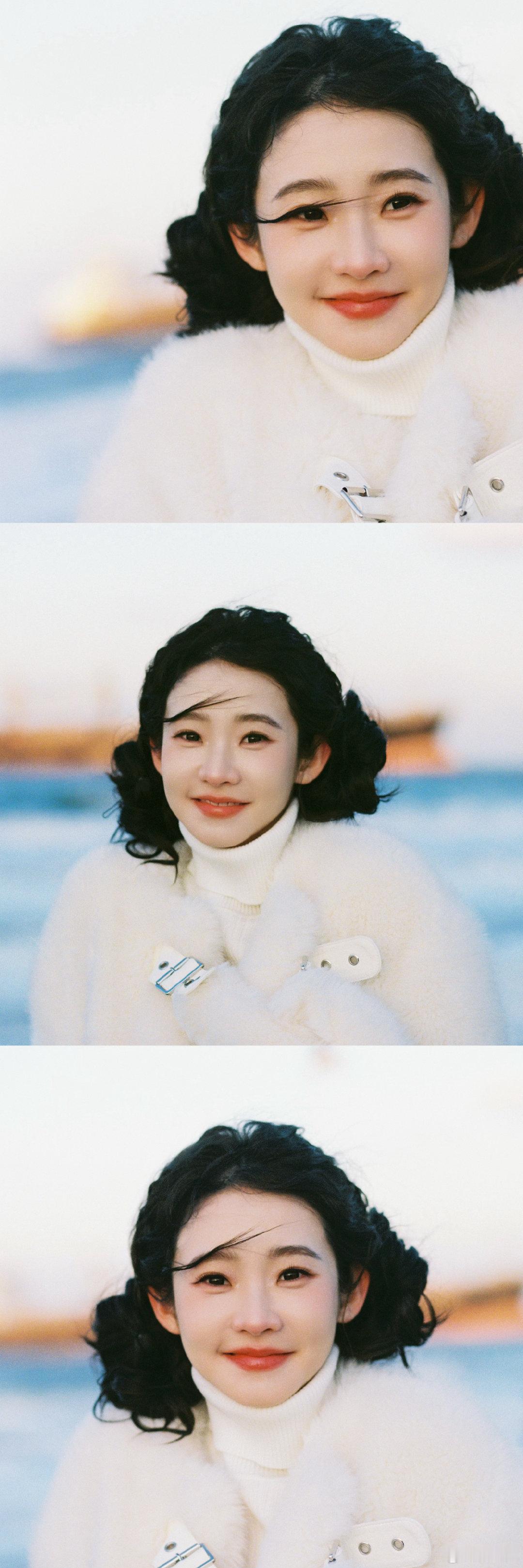 张艺凡咋萌成萨摩耶了这个张艺凡咋萌成萨摩耶了！冬日海边，站着一个奶白奶白的小团子