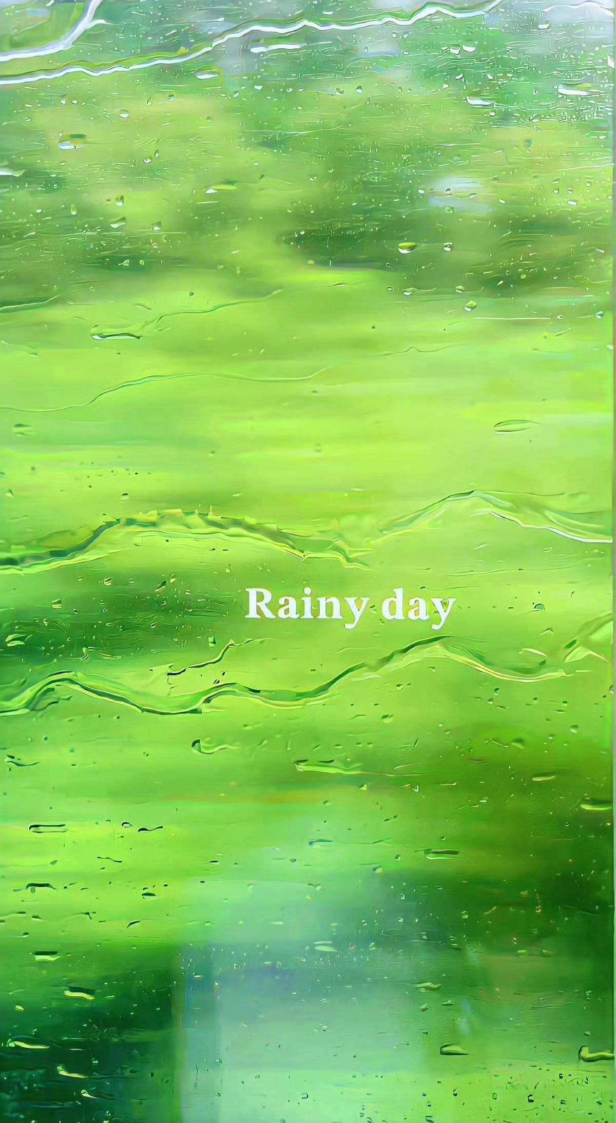 🌧️雨珠在玻璃上跳圆舞曲，把世界晕染成绿色梦境💚。此刻适合发呆，让时间随水流
