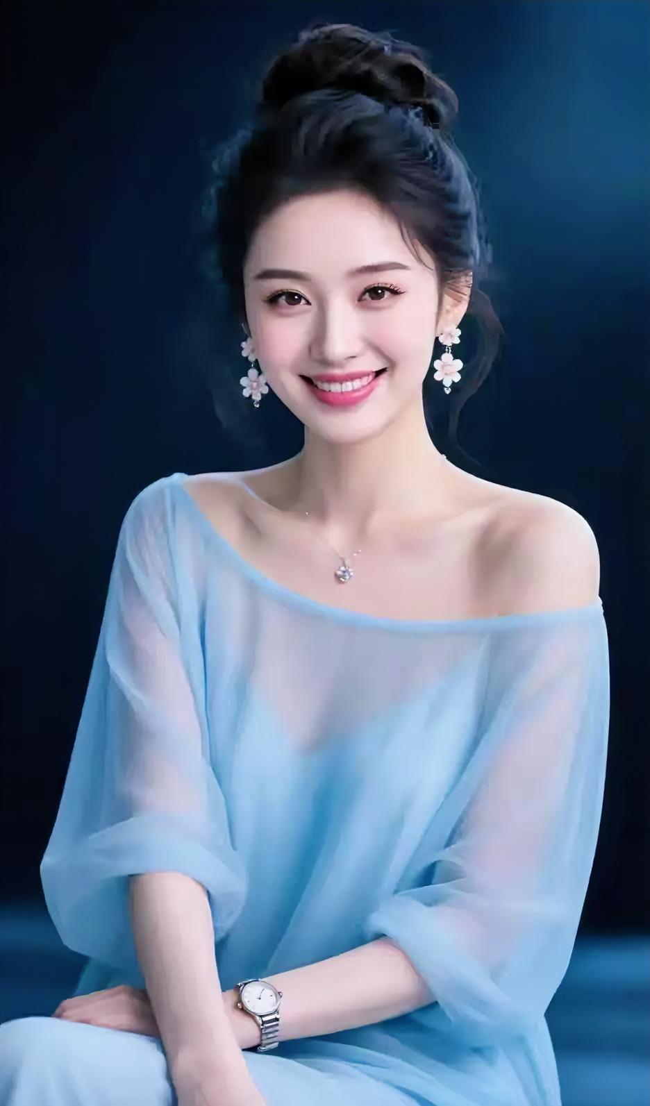 浅蓝一露，心尖就清凉了。

云袖轻垂肩头，

花坠摇着温柔。

盘发高高挽起，