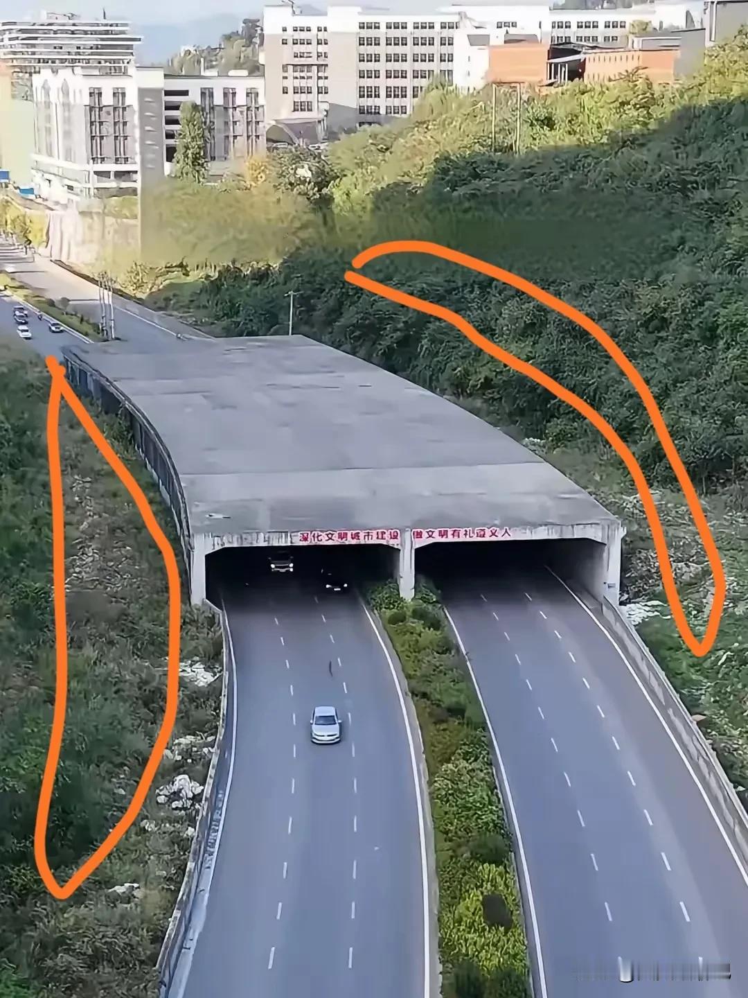 这是一个新建的省道，
让人费解的是既不穿过大山，
路两边也没有山坡，

为什么要
