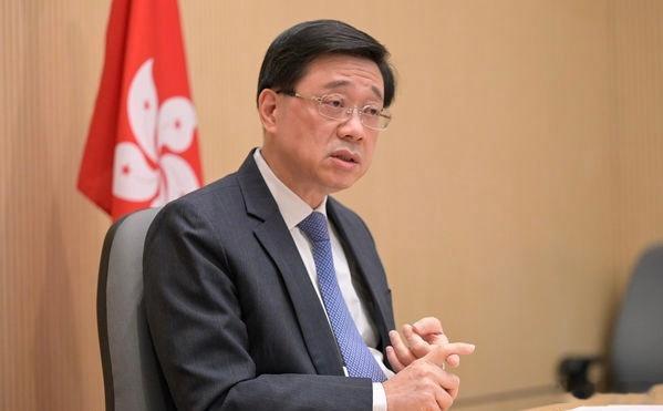 记者问，香港仅12天就完成23条立法会不会太快了？李家超：美国爱国者法案只用两天