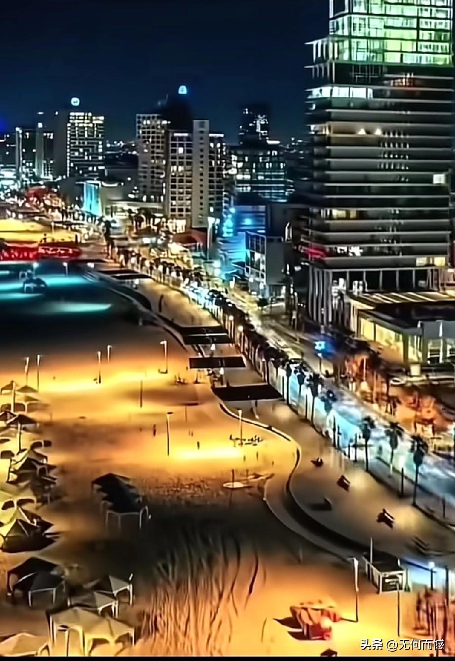 没有遭受轰炸的城市，晚间的景色非常的漂亮，灯火辉煌，霓虹闪烁，俨然就是一座不夜城