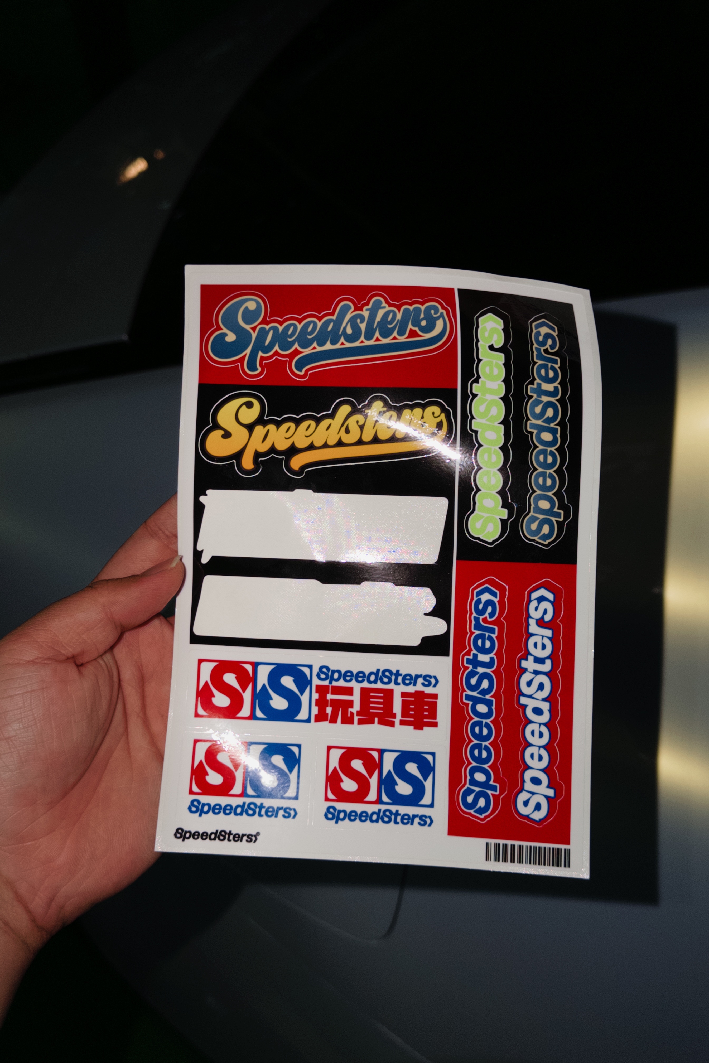 买了极速拍档的贴纸，把过年被小孩放炮崩坏的车衣贴起来了“屌丝战斗机”！极速拍档贴