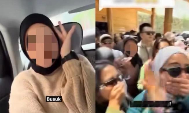 一群马来西亚游客在中国景区当众捂鼻喊“好臭”“都不洗澡”，仗着我们听不懂马来语，