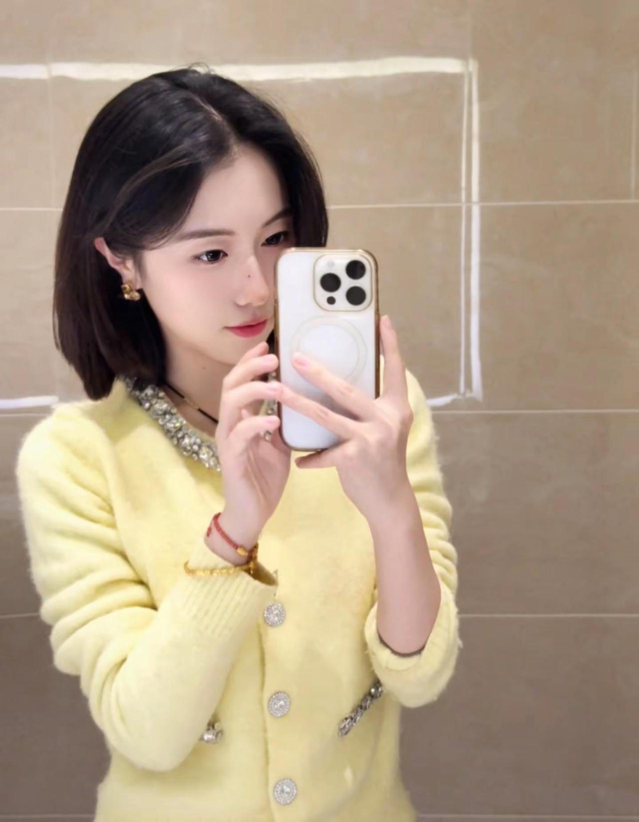 怎么又给我剪成短头发了