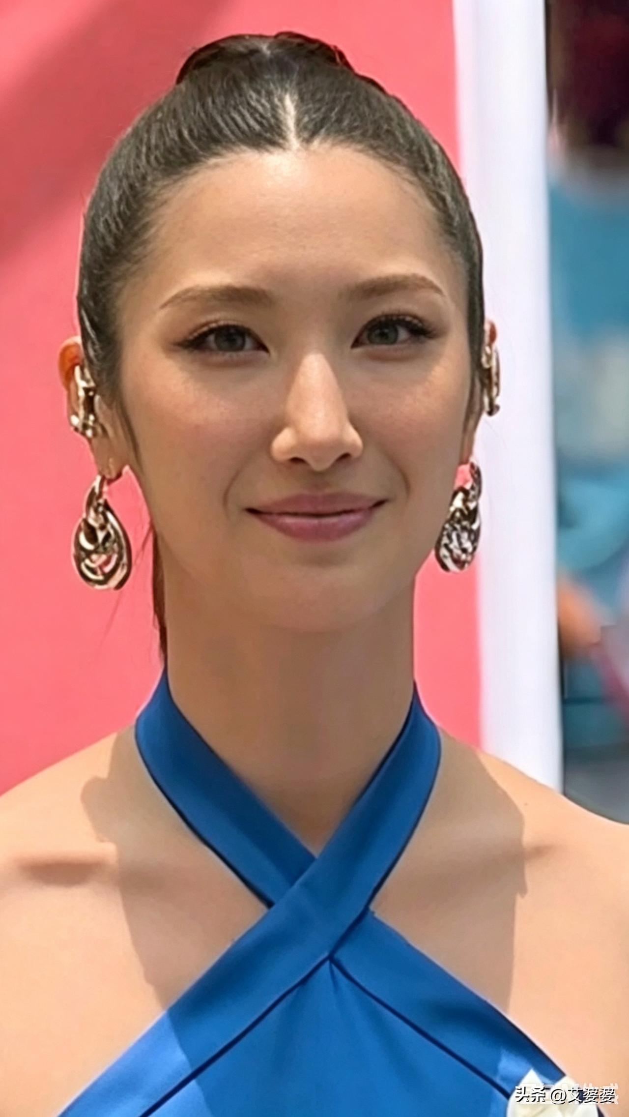 2026世界杯主题曲《DNA》，女主唱，金恩宰（EJAE），韩裔美国歌手。